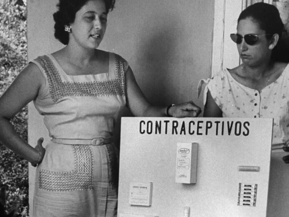 b/w photo of women in a contraceptives demonstration  