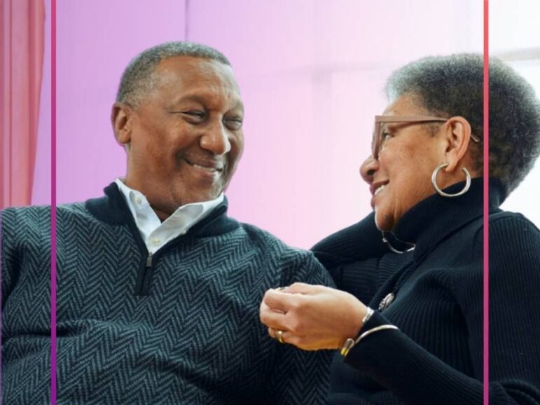 happy man smiling at his wife