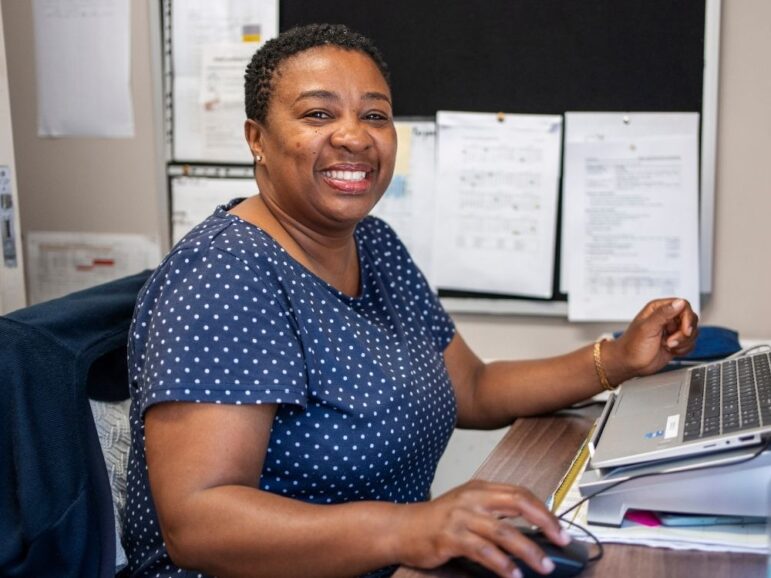 smiling hospital admin woman