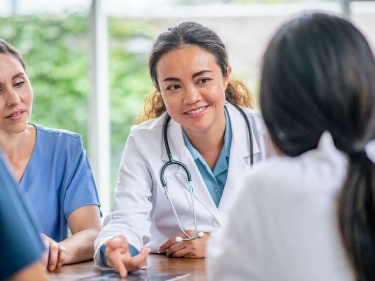 doctors talking to a candidate