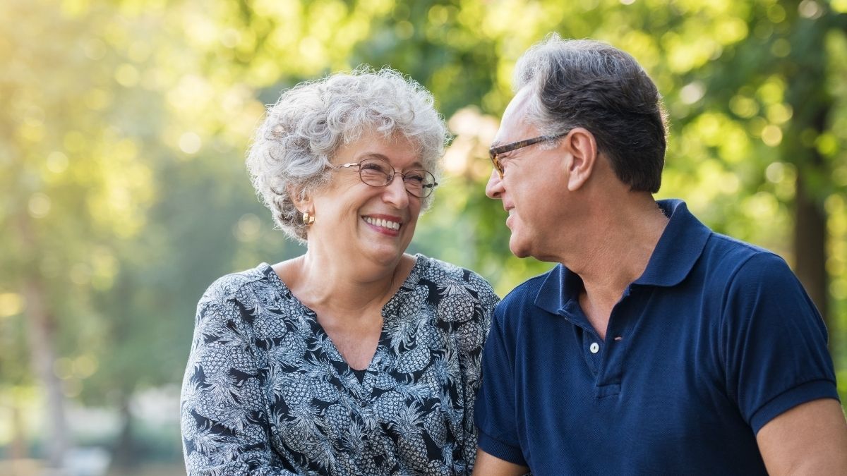 smiling woman talking to a doctor