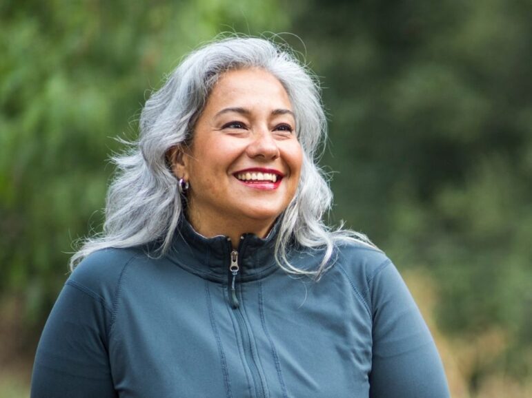 smiling mature woman is optimistic